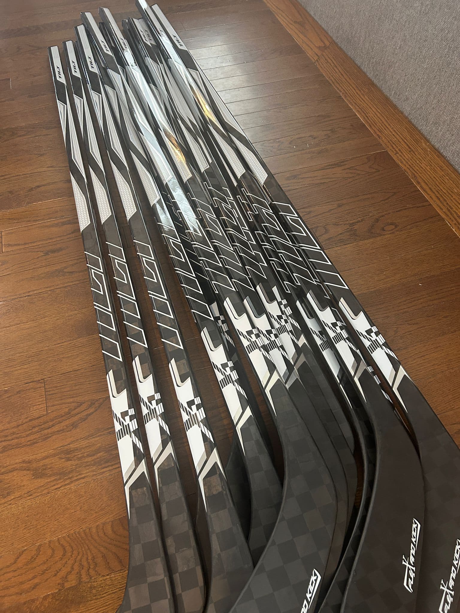 Tilt hockey sticks featuring ResponzRezin blade resin technology